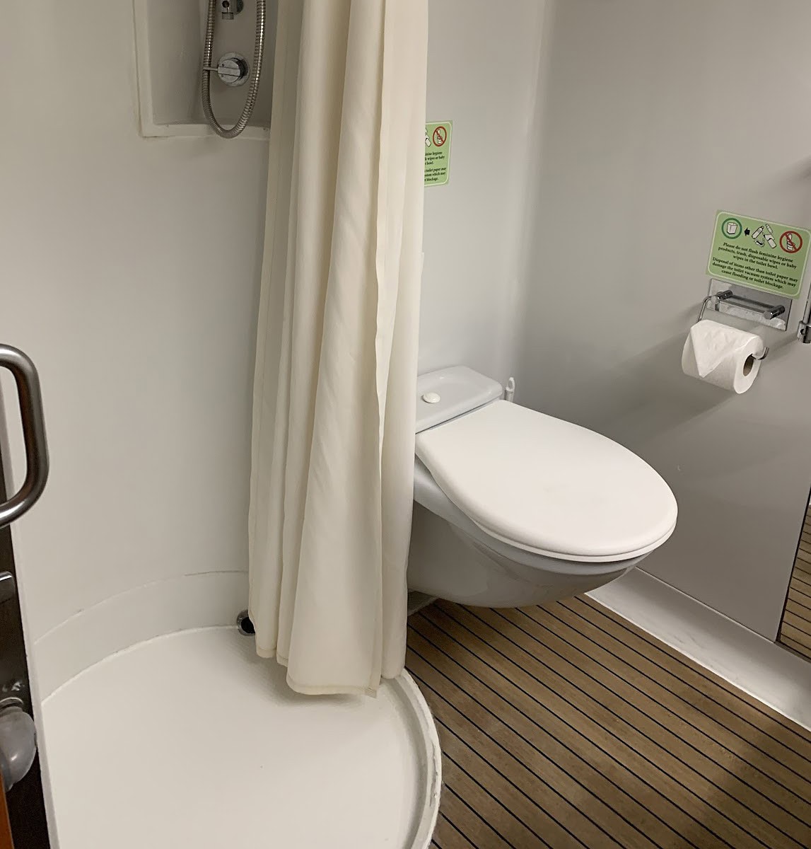 The Margaritaville at Sea interior stateroom bathroom showing the shower and bathroom.