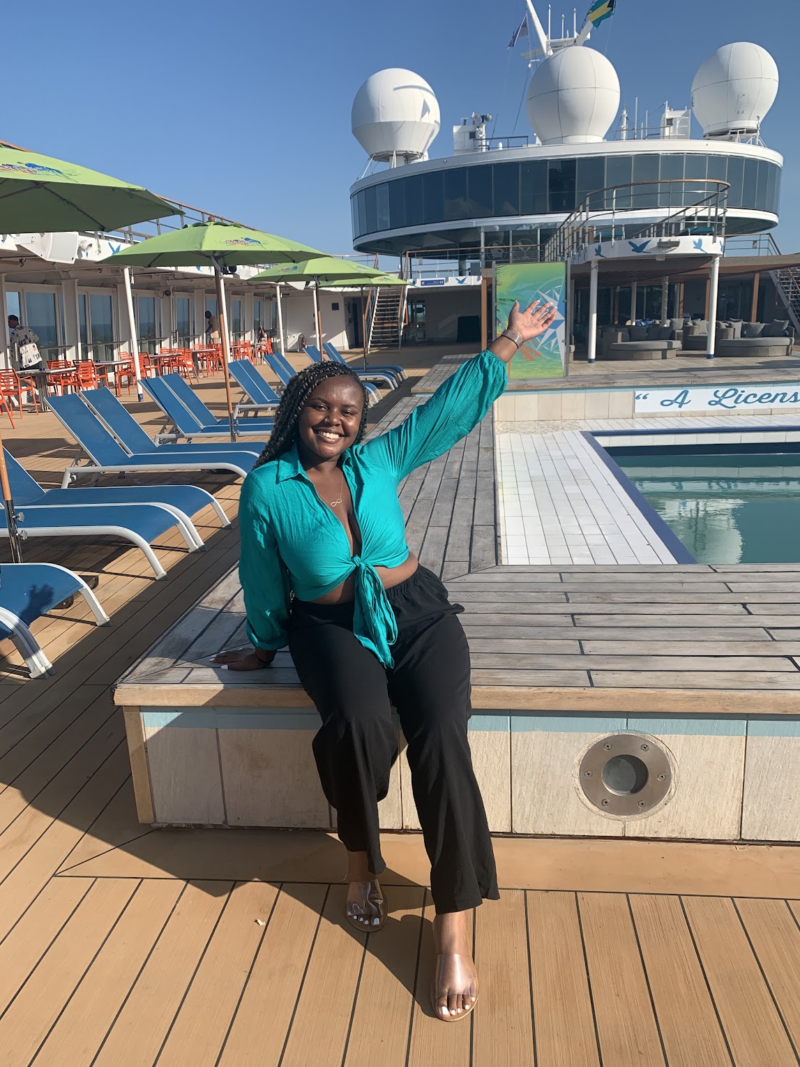 Blogger Christina Jane on the main deck of the Margaritaville At Sea Cruise
