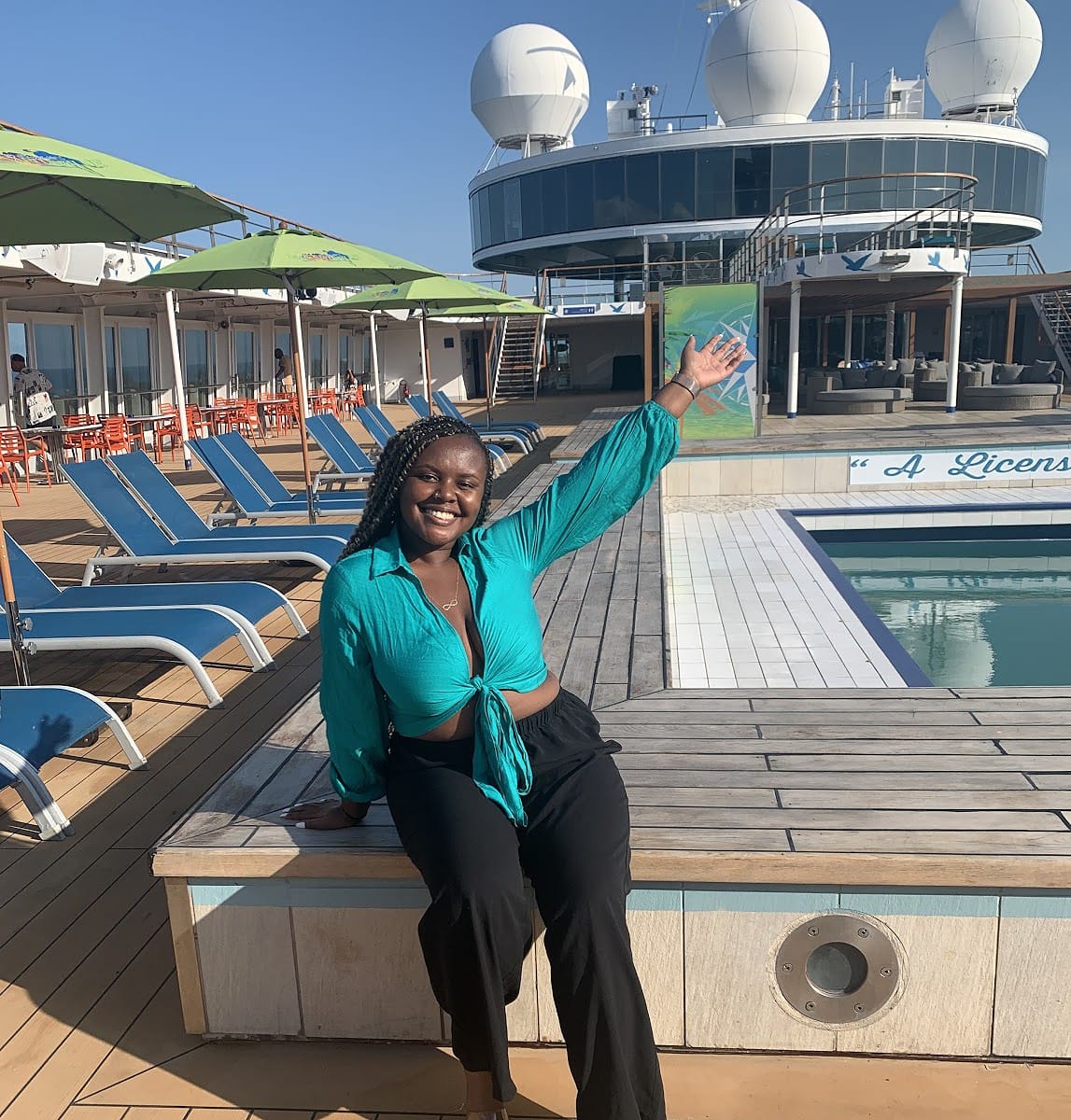 Blogger Christina Jane on the main deck of the Margaritaville At Sea Cruise