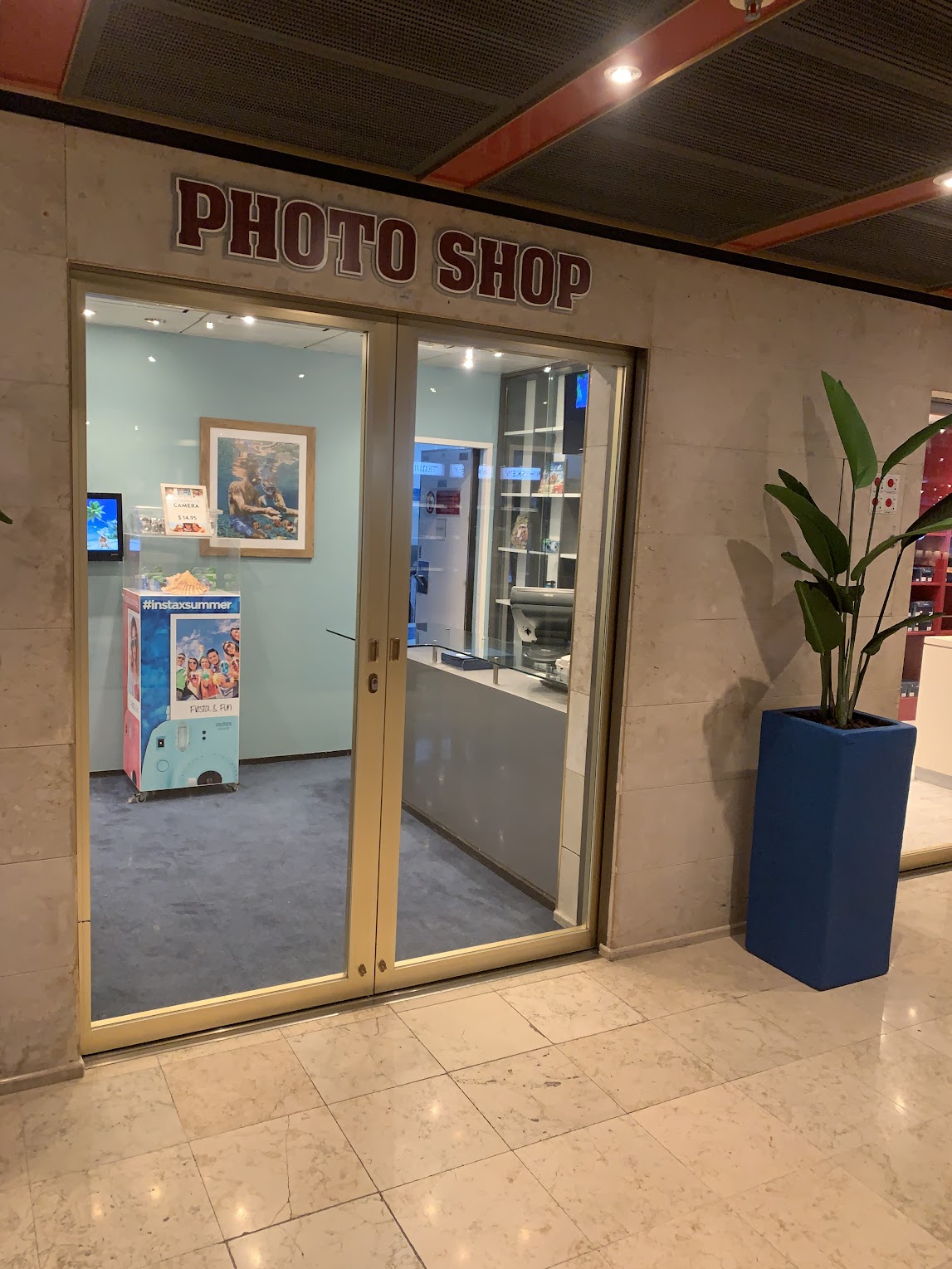 The storefront of the photography shop on the Margaritaville At Sea cruise ship. 
