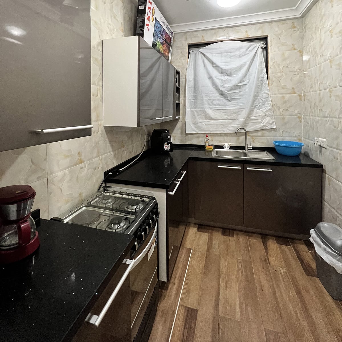 A kitchen inside of an apartment in Accra. 