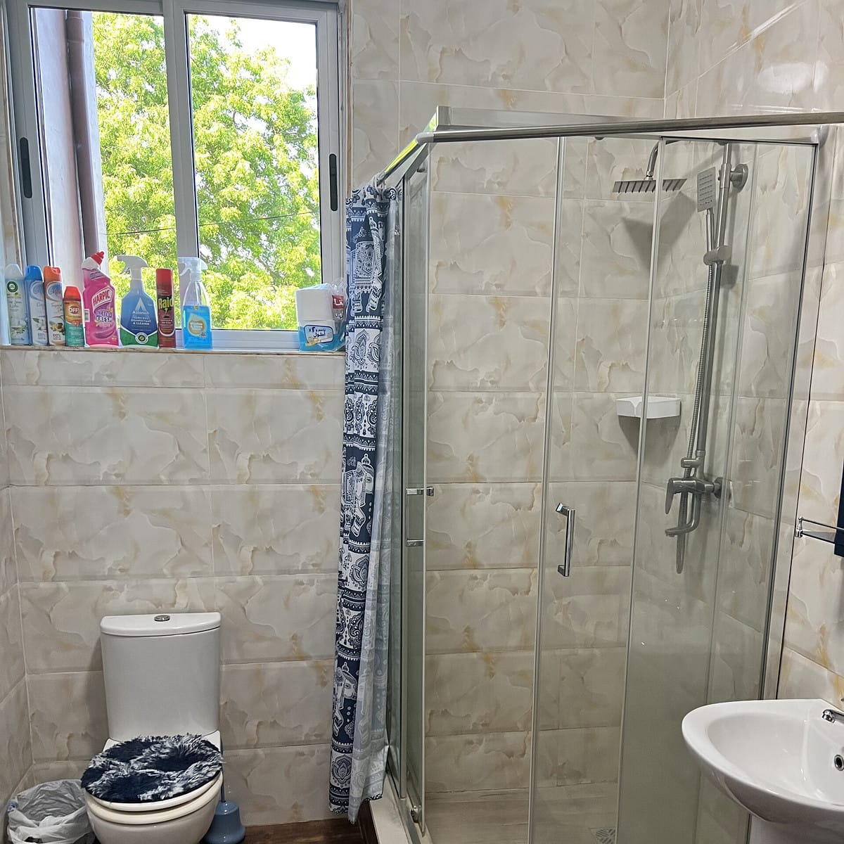 A bathroom inside of a bathroom in Accra. 