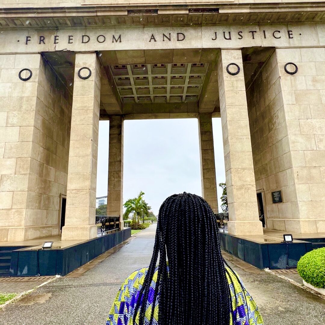 Christina Jane standing in front of the Independence Square in Accra 