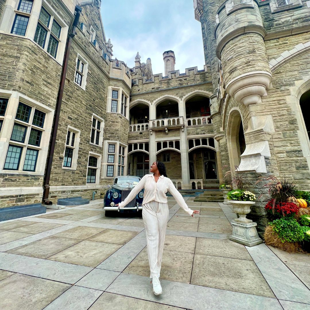 Christina Jane in front of Casa Loma in Toronto 