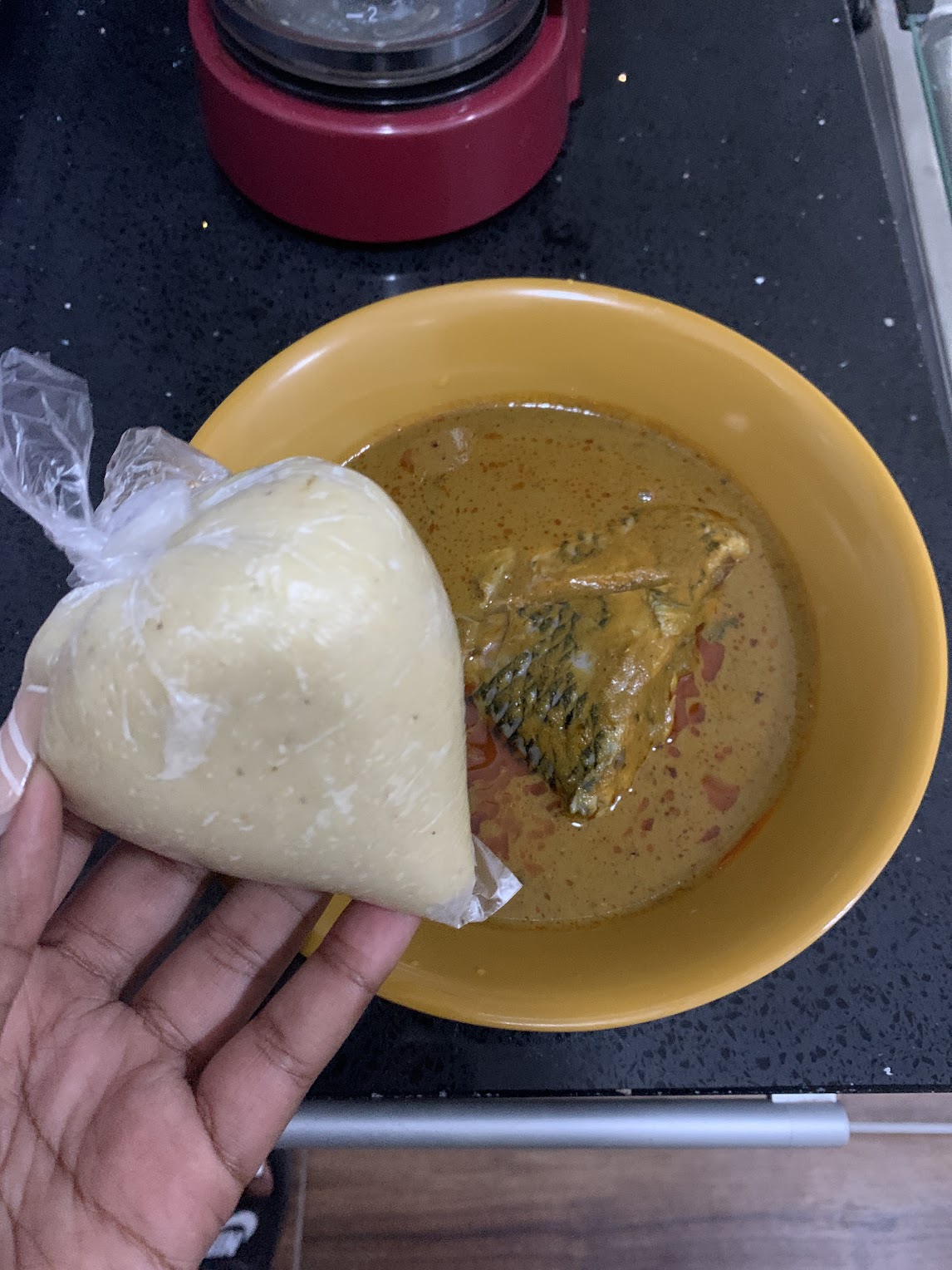 Groundnut soup w/ banku 