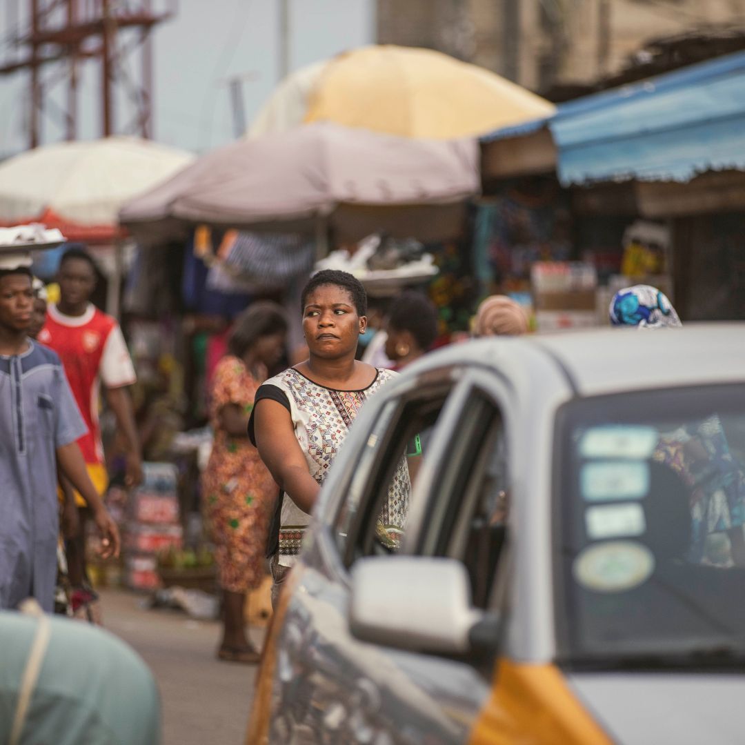 People walking in a market in Ghana 