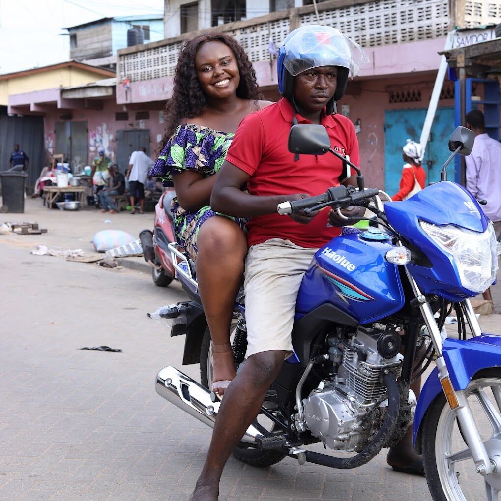 Christina Jane riding a motorcycle 