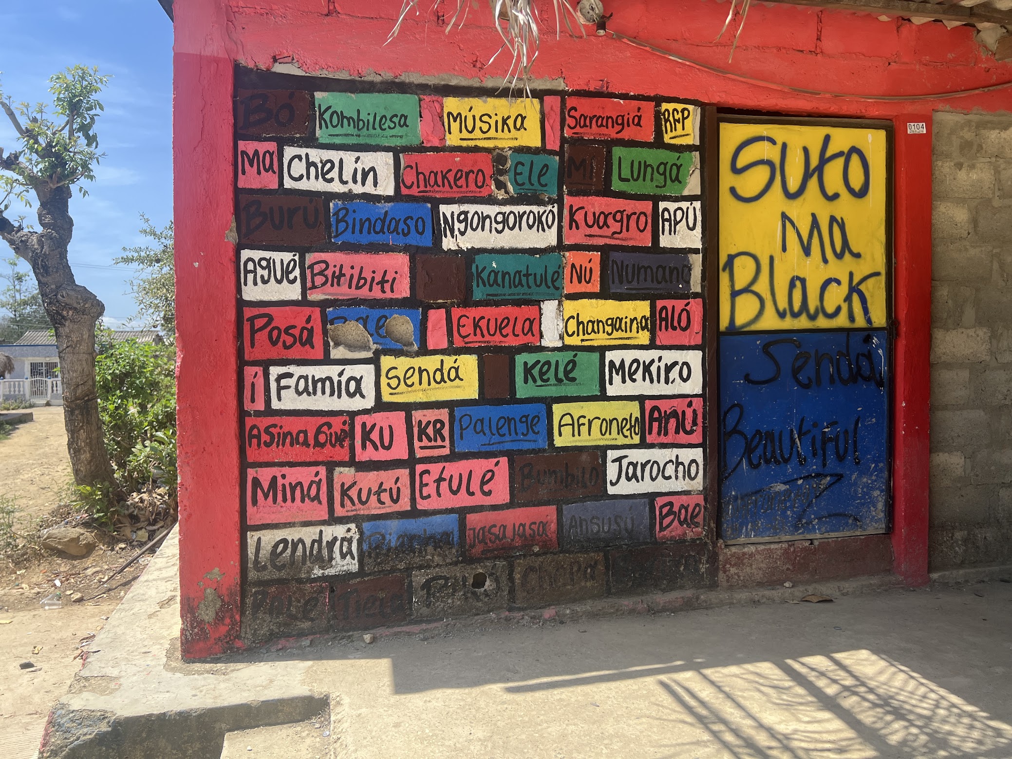 A wall filled with words from the Palenquero language