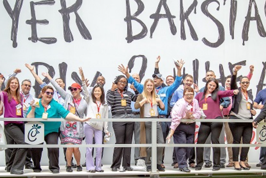 A group of visitors at the Chick fil A Backstage Tour