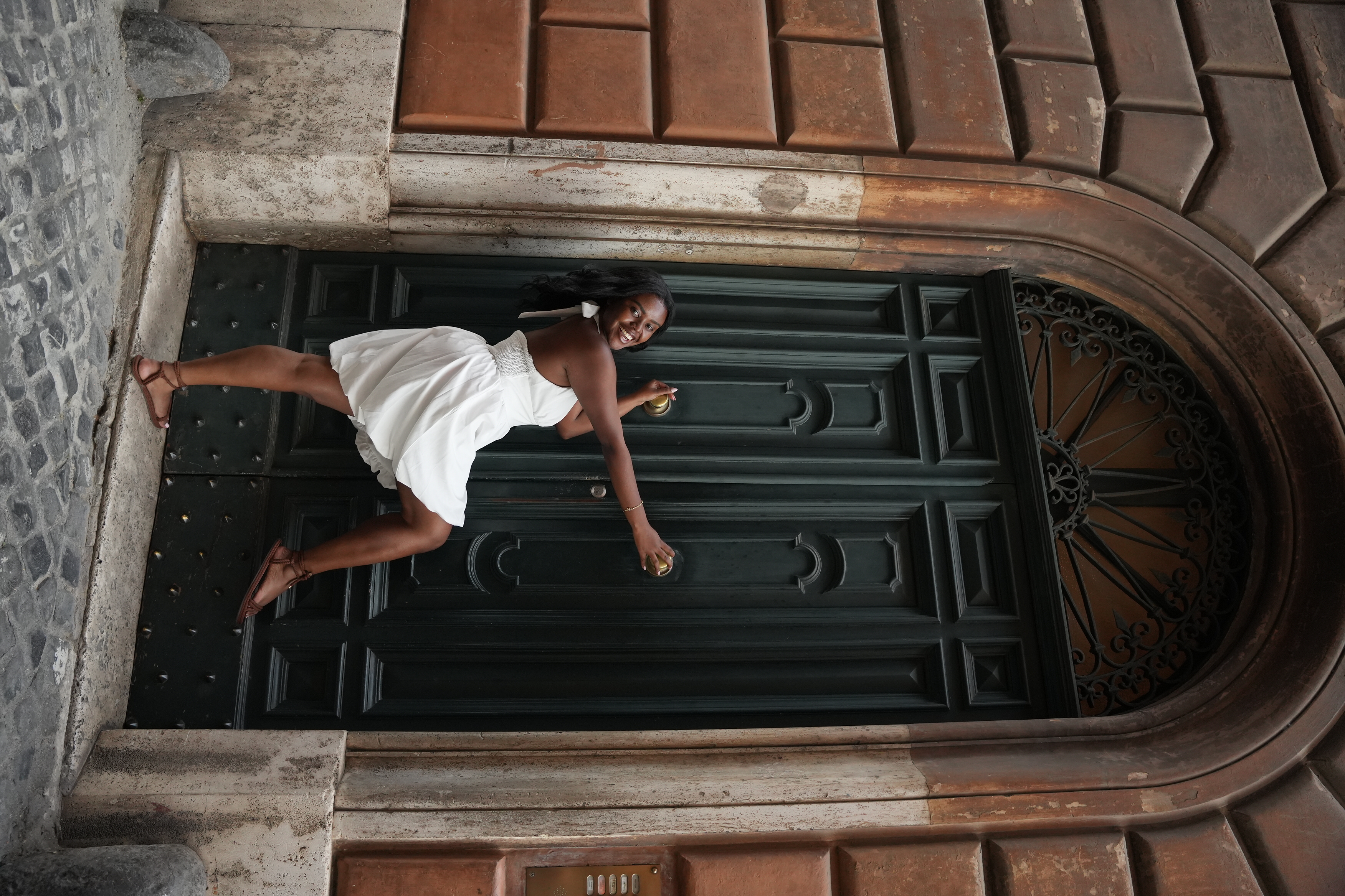 Christina Jane posing in front of the door