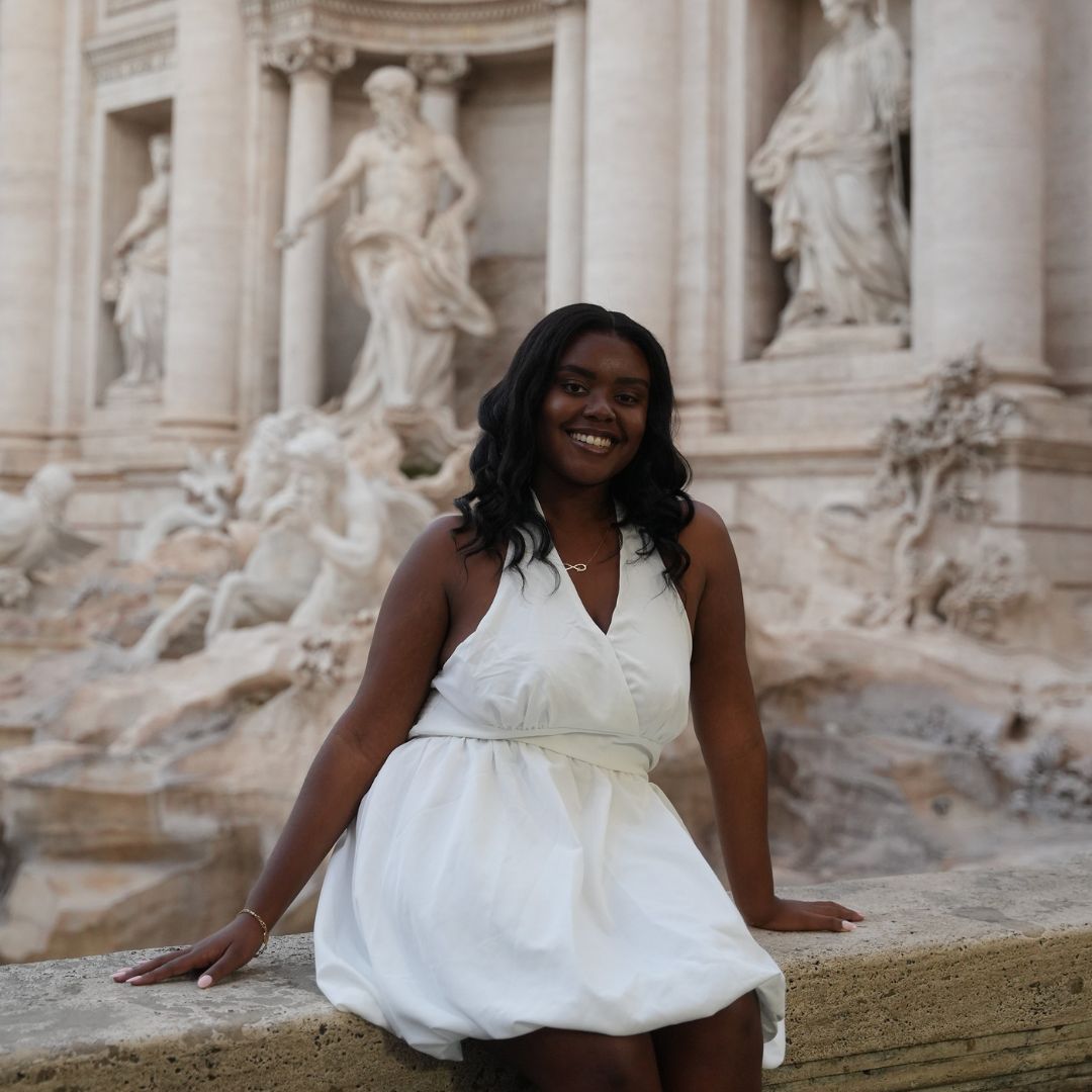 Christina Jane in front of the Trevi Fountain