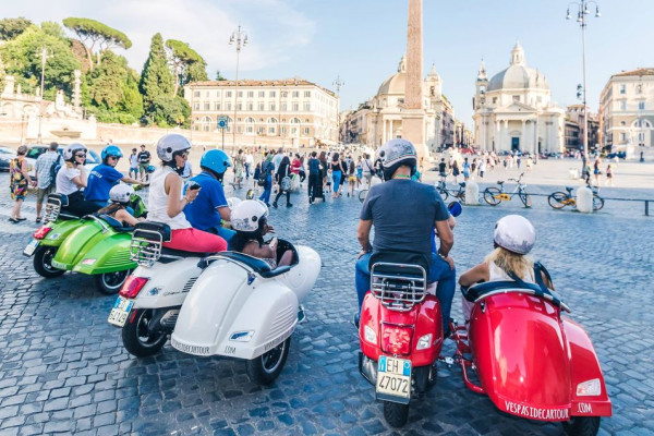 A group of tourists enjoying the sidecar tour