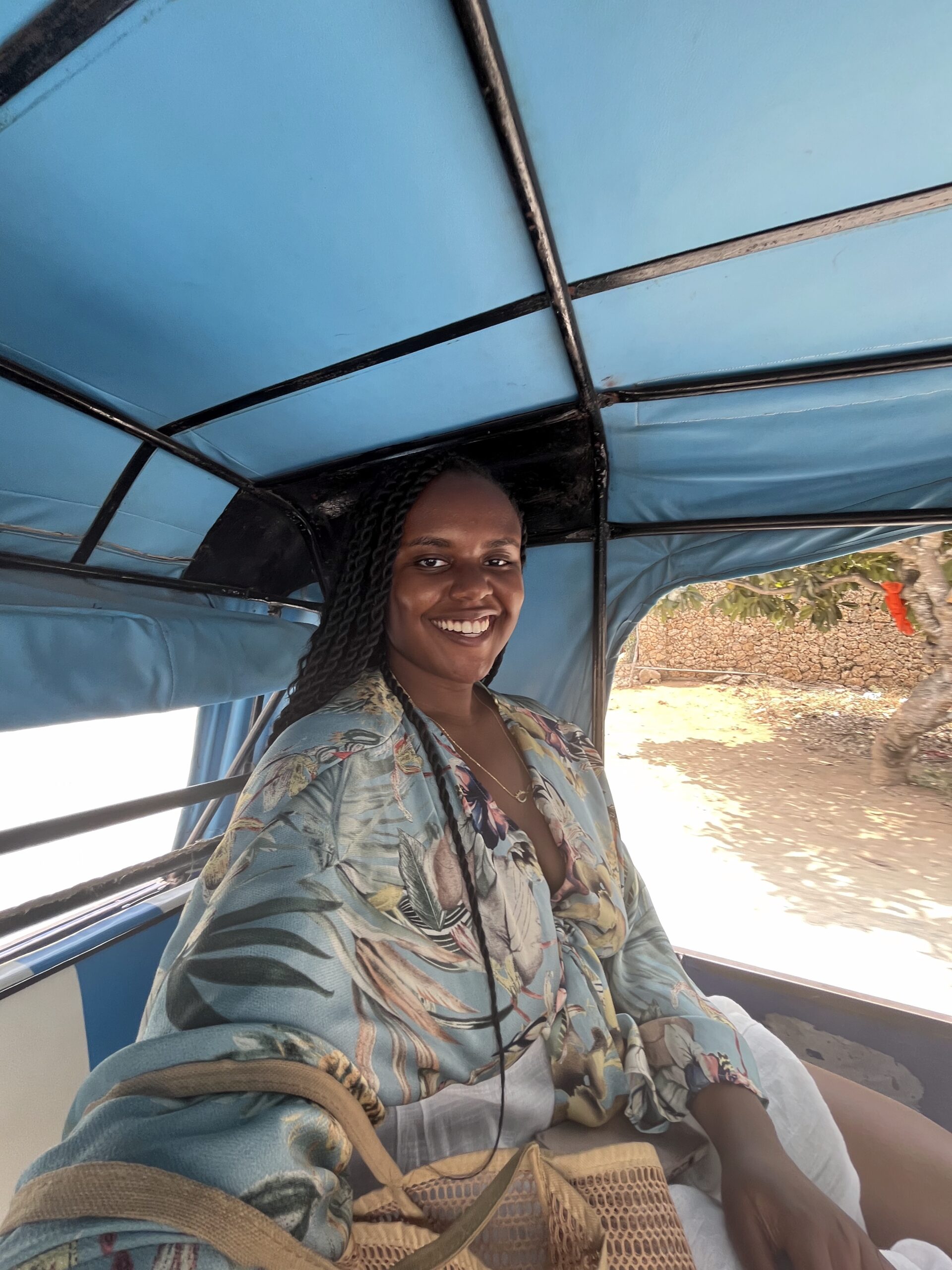 Christina inside of a tuk tuk