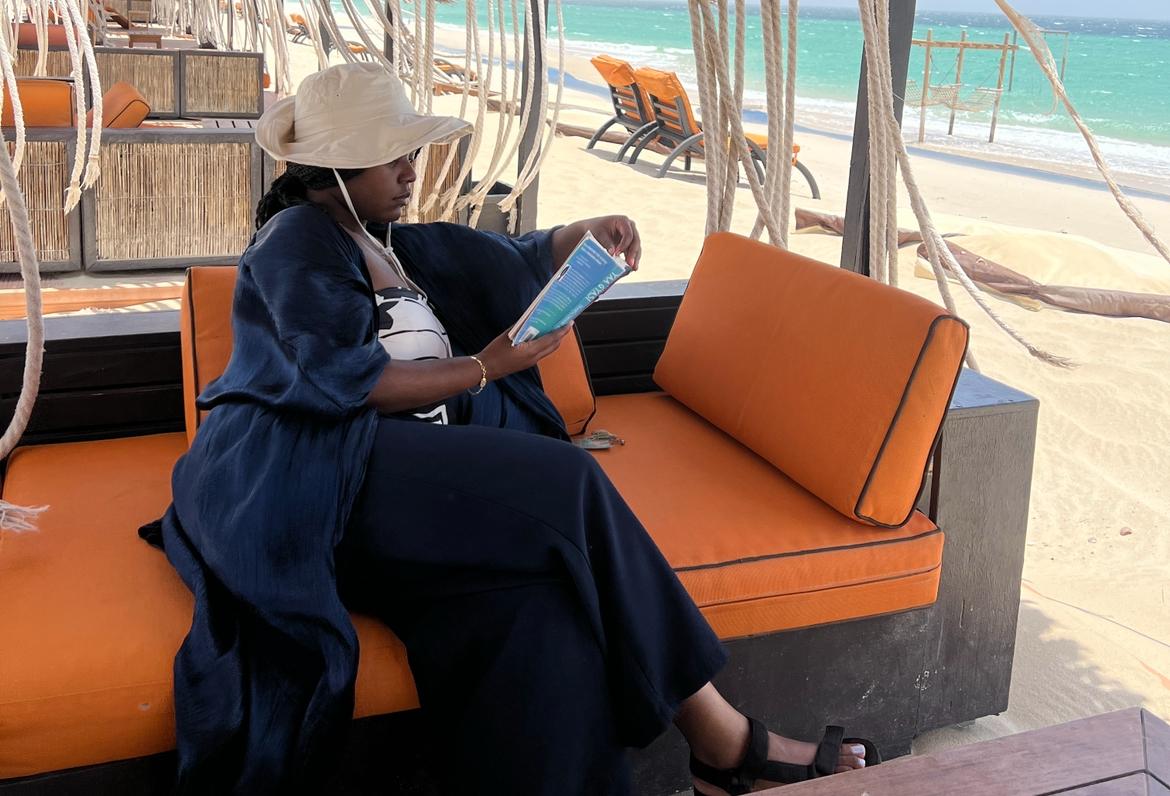 Christina Jane reading in the gazebo