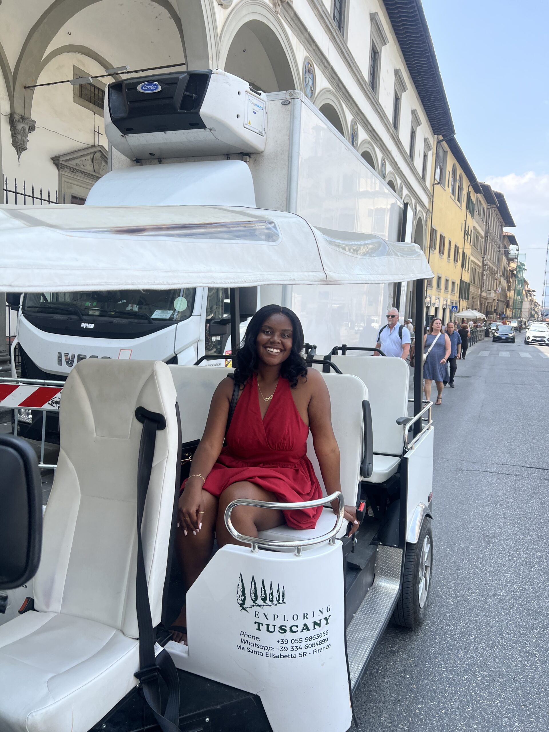 Christina on the golf cart