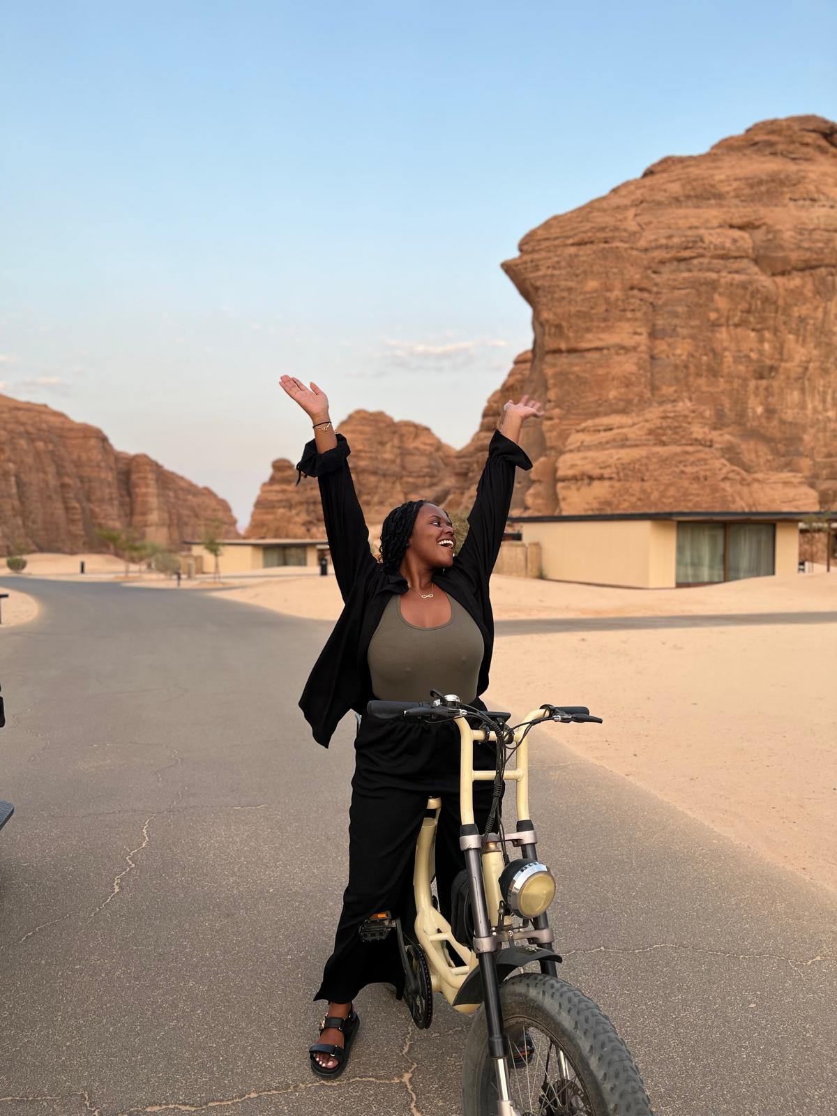 Christina Jane riding an e-bike