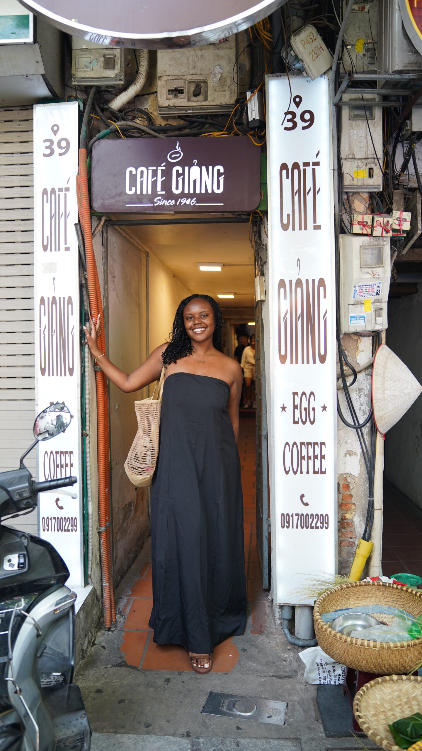 Christina Jane at the entrance of Cafe Giang 