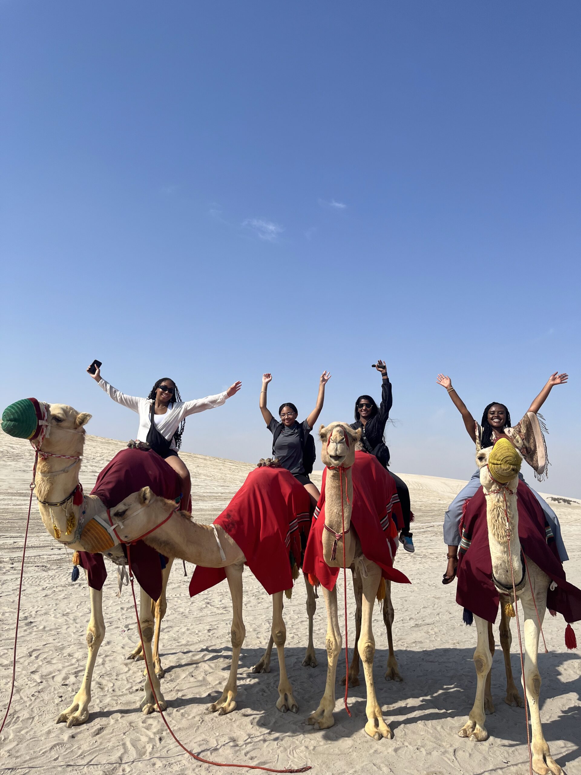 Camel riding in the desert 