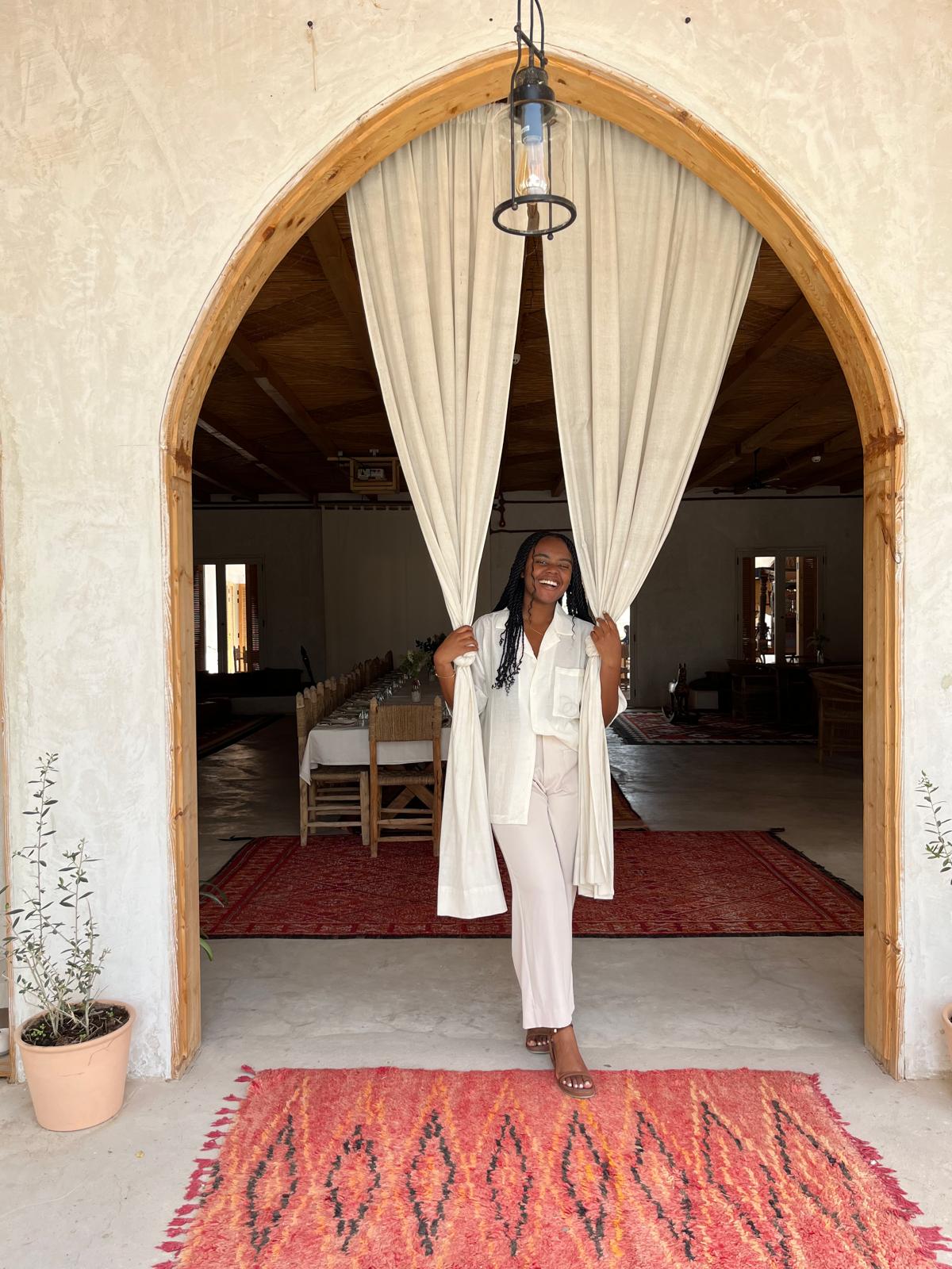 Christina Jane wearing a top and bottoms 