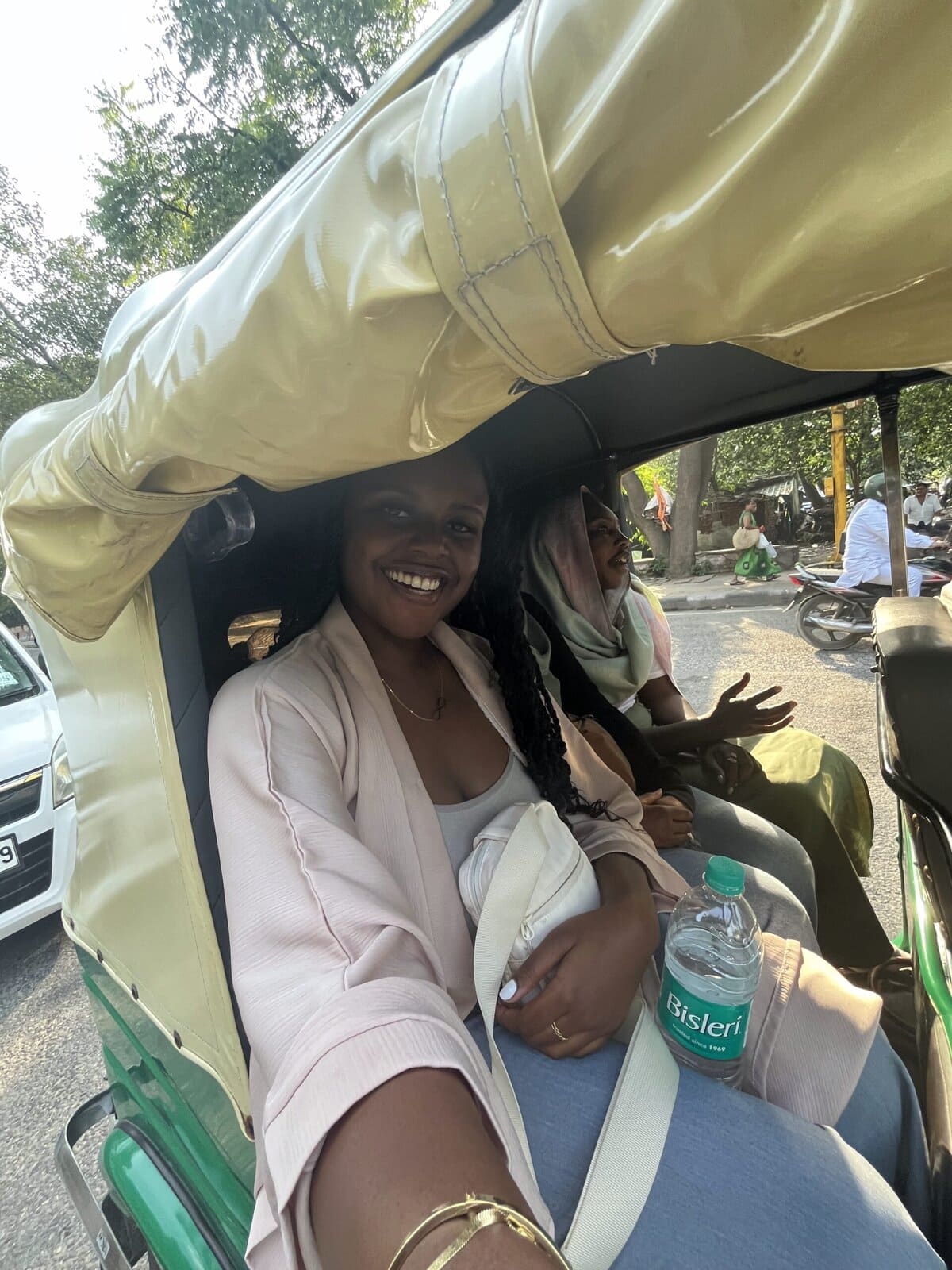 Christina Jane inside of a rickshaw