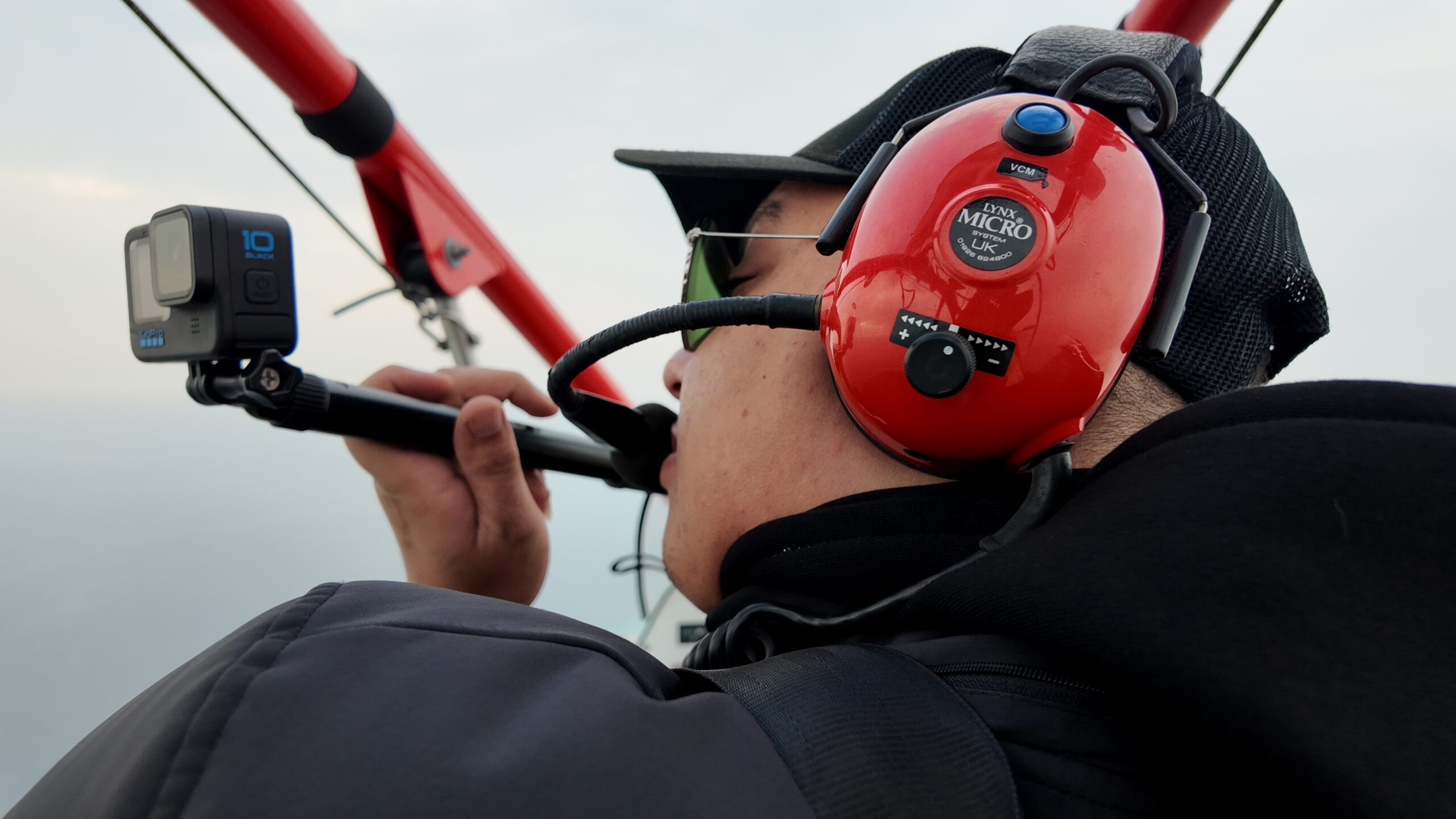 Pilot capturing footage on a GoPro