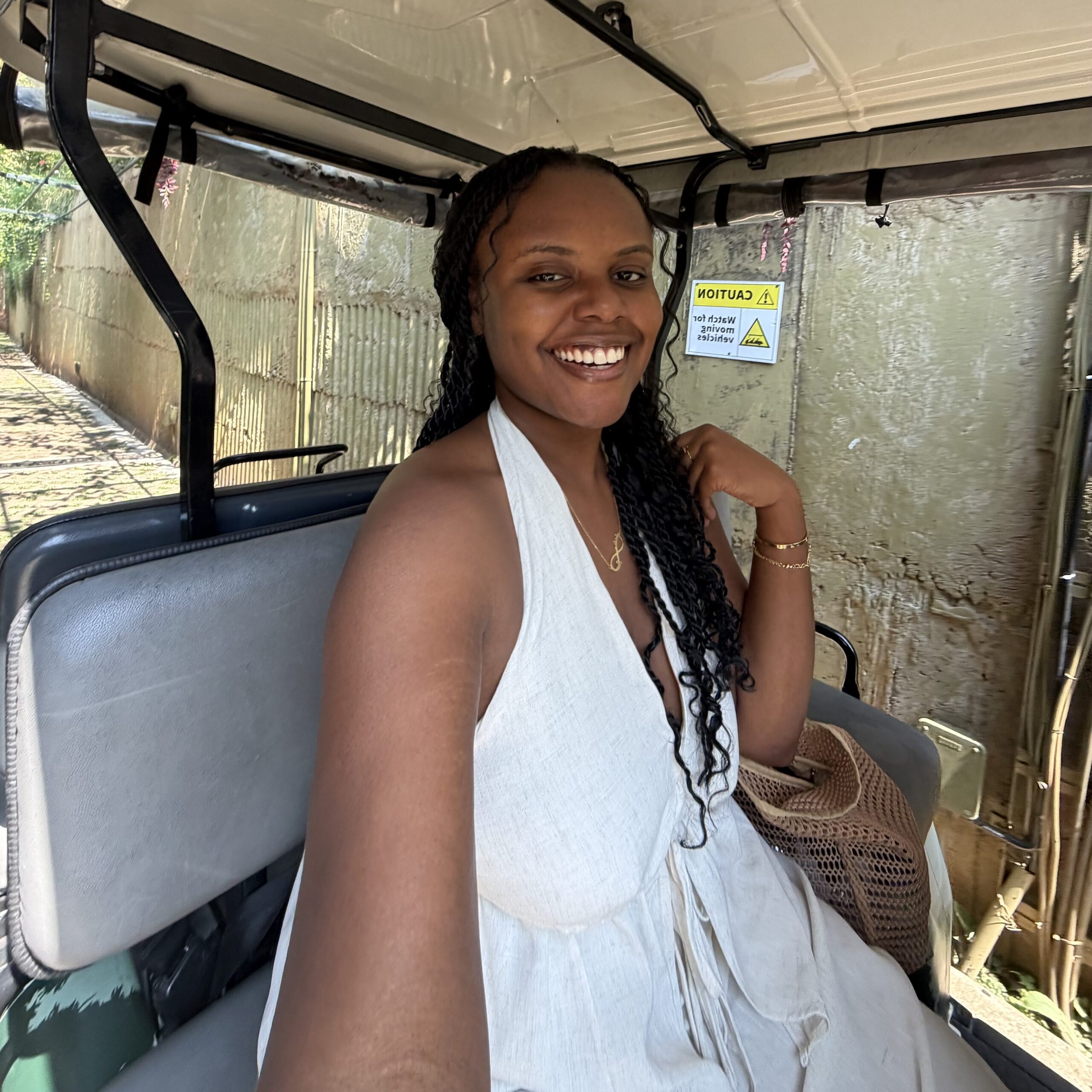 Christina on a golf cart