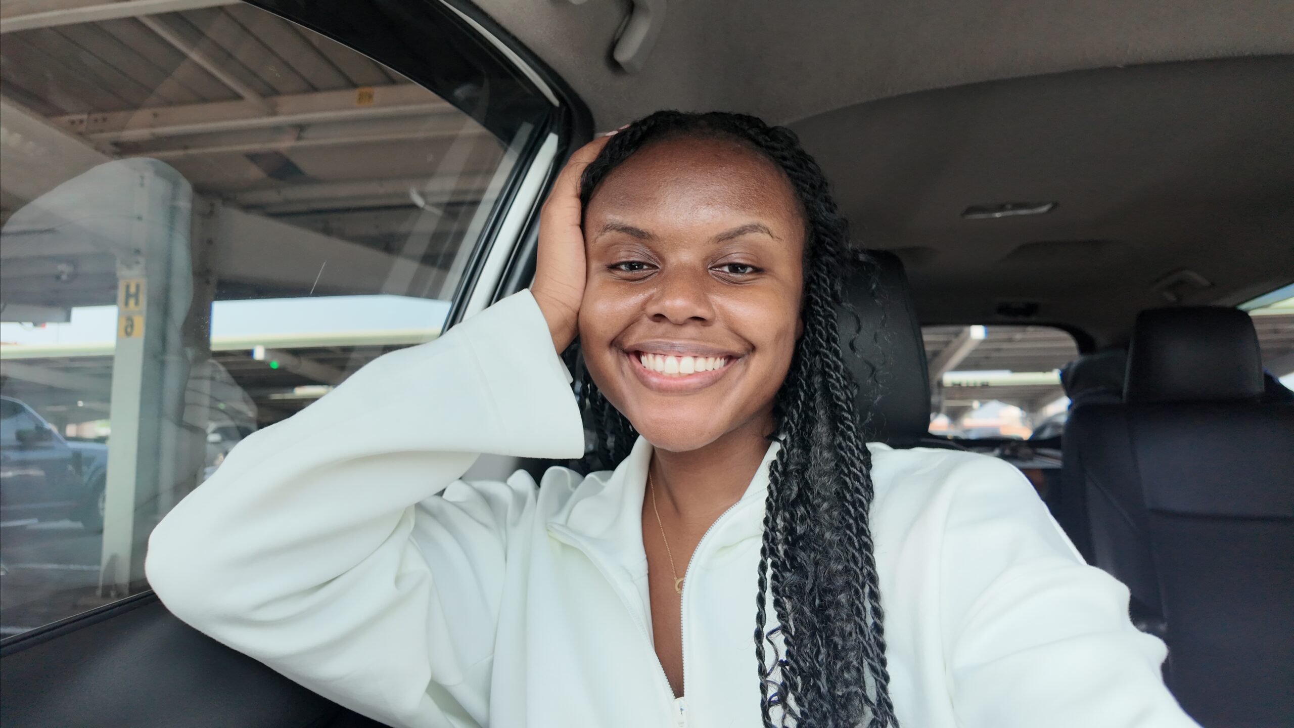 Christina inside the car